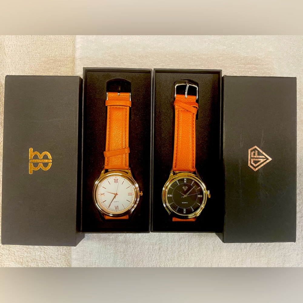 NEW pair of two analog watches. Now wear or tear. Sold as a pair.